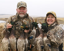 Paul & Suzanne enjoy hunting at Paul's Ponds.